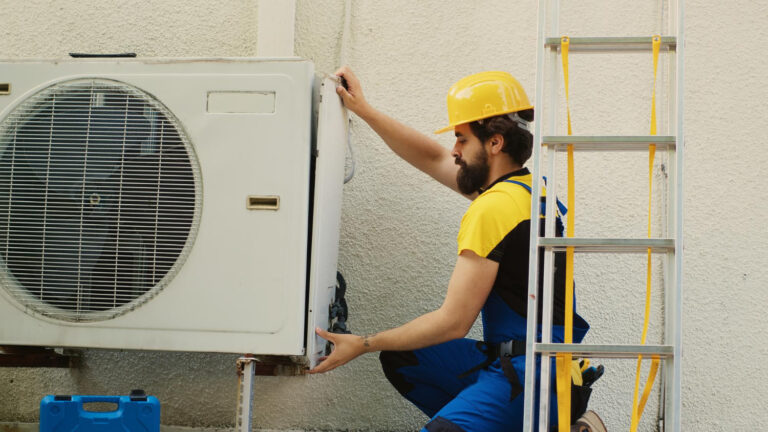 HVAC Landing Page 4 Technician installing an outdoor air conditioner