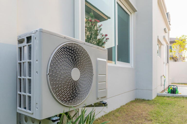 HVAC Landing Page 3 Outdoor heat pump unit beside a home